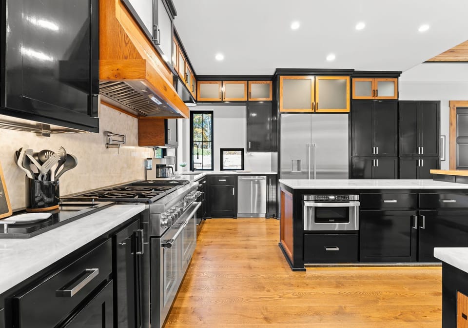 Huge, modern, fully stocked kitchen with two island seating options seating 8+. 