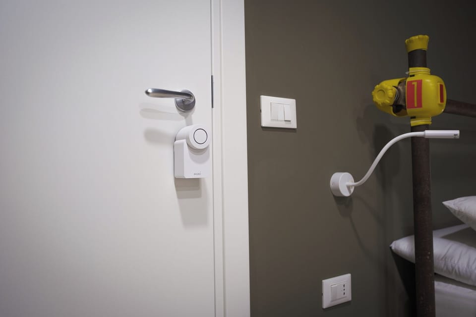 Comfort Quadruple Room, Non Smoking | In-room safe, desk, laptop workspace, blackout drapes