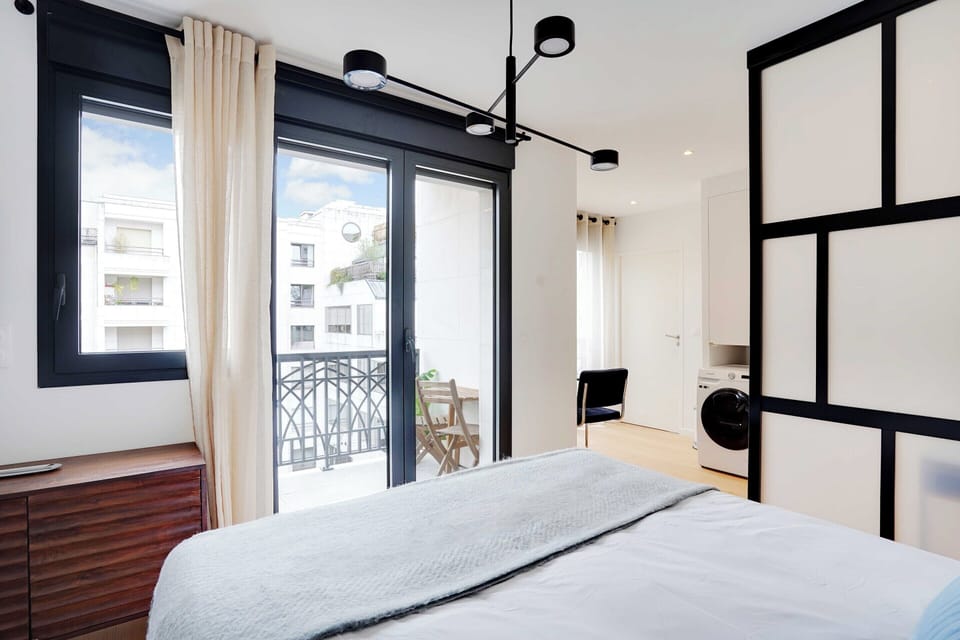 Apartment | Laptop workspace, iron/ironing board, bed sheets
