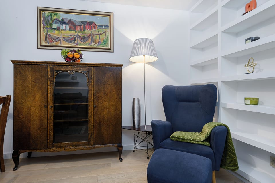 Deluxe Apartment, Balcony, Courtyard View | Living area | 40-inch TV with digital channels