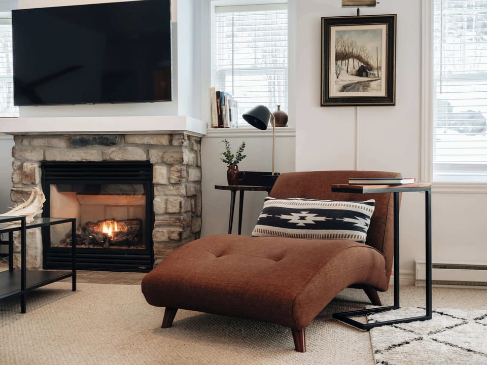Reading chair, and fire that feels instantly comforting