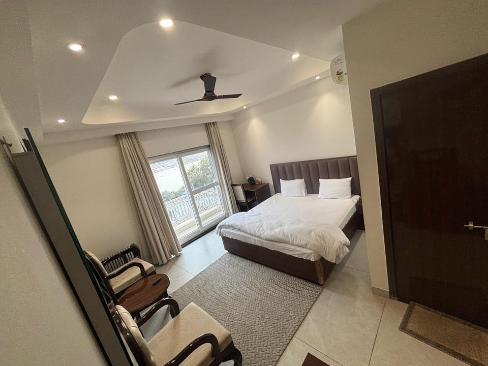 Executive Double Room, Balcony | In-room safe, desk, laptop workspace, blackout drapes