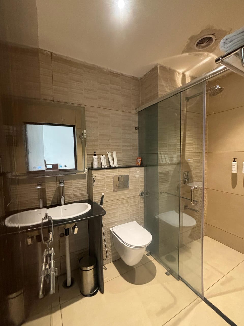 Shower, free toiletries, hair dryer, slippers