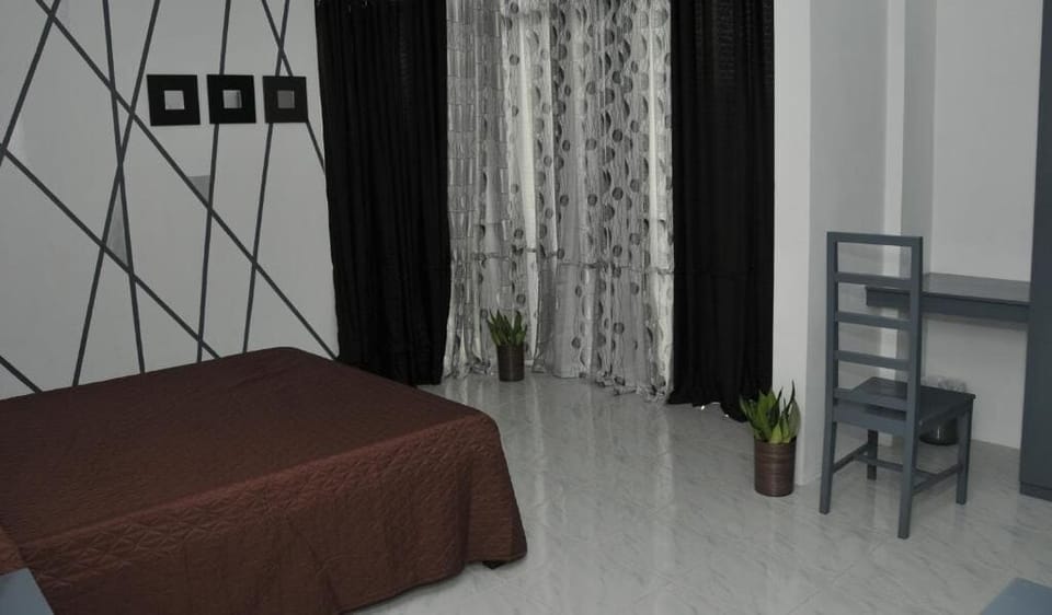 Deluxe Quadruple Room, City View | Free WiFi