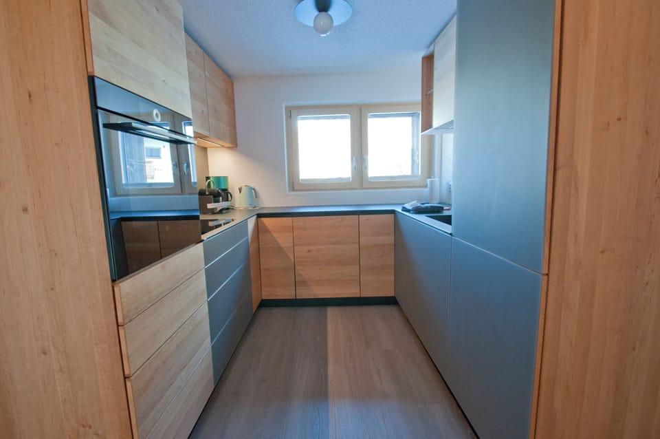 Apartment, Balcony, Mountain View | Private kitchen | Highchair