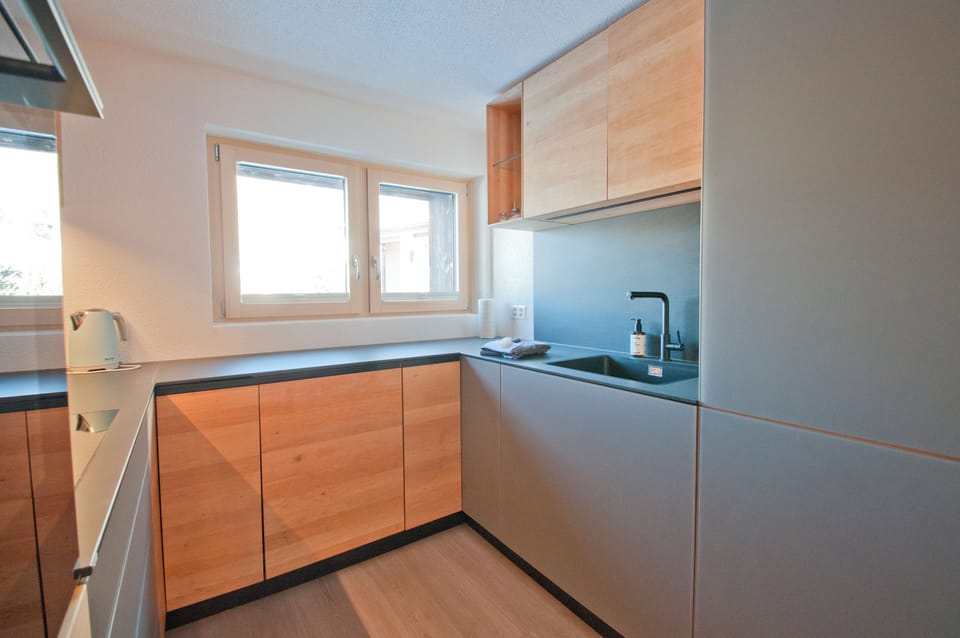 Apartment, Balcony, Mountain View | Private kitchen | Highchair