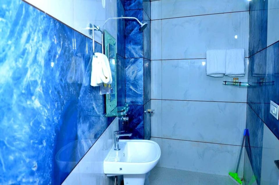 Shower, towels, soap, shampoo