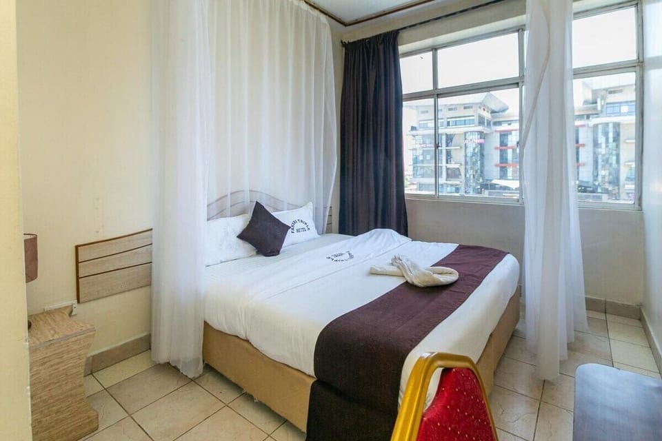 Deluxe Double Room, City View | Desk, laptop workspace, iron/ironing board, free WiFi