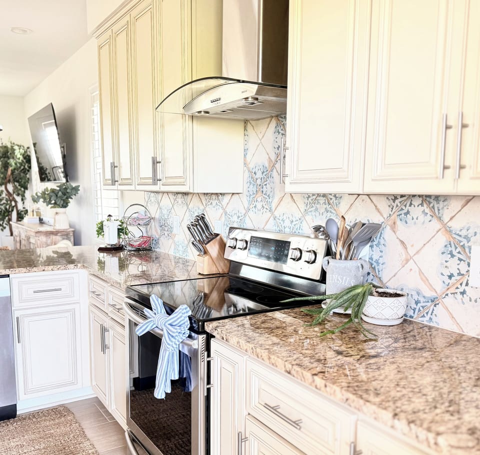 This custom kitchen makes cooking fun and is fully stocked!
