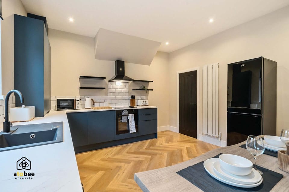 Enjoy the convenience of a well-designed kitchen that blends modern appliances with cozy charm.