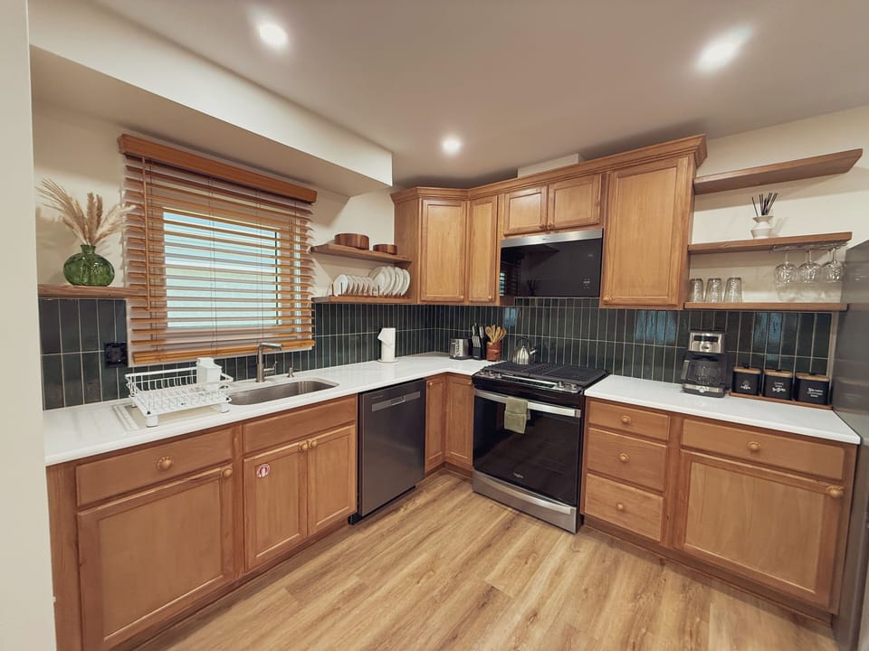 Fully stocked for your needs modern kitchen with all brand new appliances.