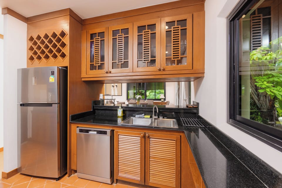 Family Villa, Lanai, Pool View | Private kitchen | Coffee/tea maker, electric kettle, highchair