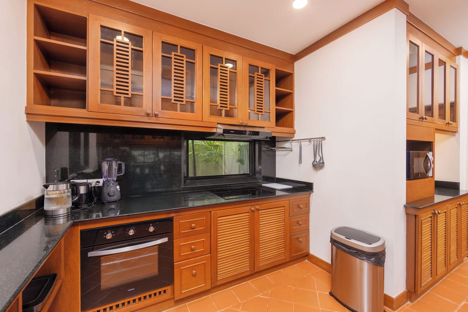 Family Villa, Lanai, Pool View | Private kitchen | Coffee/tea maker, electric kettle, highchair