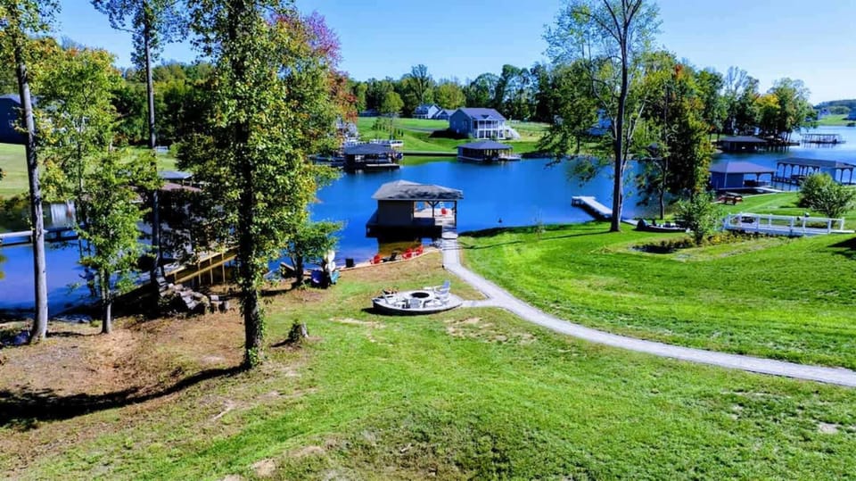 Fire Pit - Where the weekend's best conversations happen, with the lake just beyond the flames.