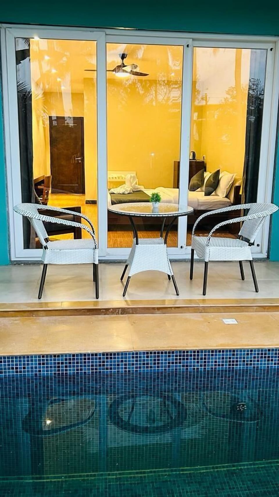 Deluxe Double Room, Balcony, Pool View | Living area | 32-inch LED TV with premium channels, fireplace
