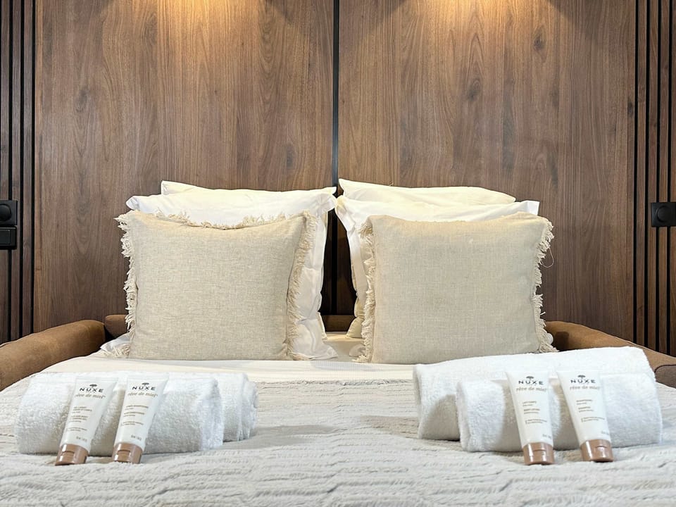 Enjoy extra comfort with a generous array of pillows
