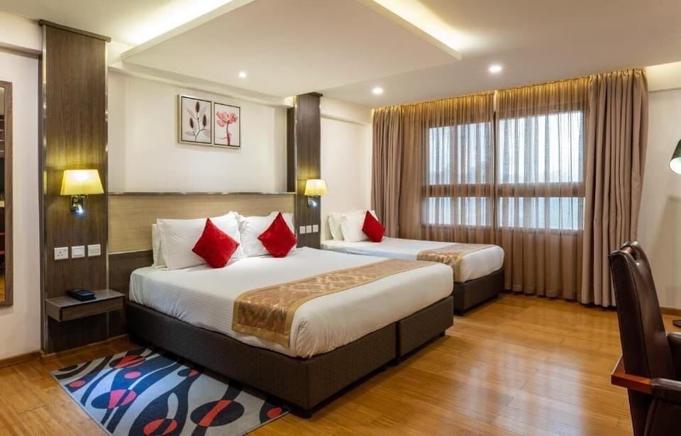 Deluxe Double or Twin Room | In-room safe, desk, laptop workspace, blackout drapes
