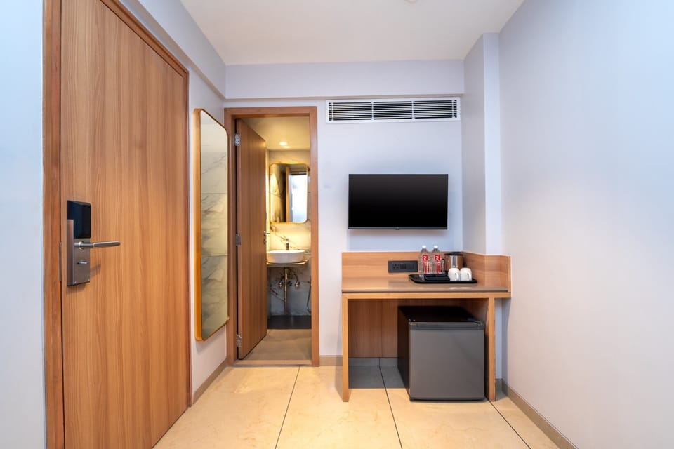 Economy Single Room | Blackout drapes, iron/ironing board, free WiFi, bed sheets