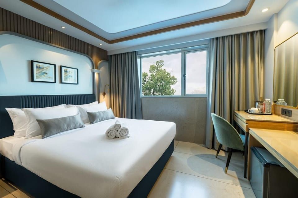 Deluxe Double Room | Blackout drapes, iron/ironing board, free WiFi, bed sheets