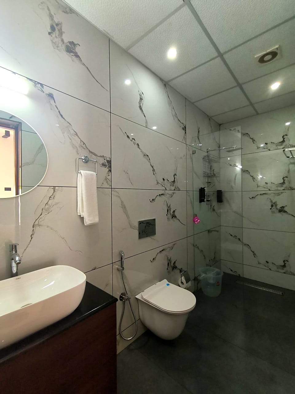 Shower, towels, soap, shampoo
