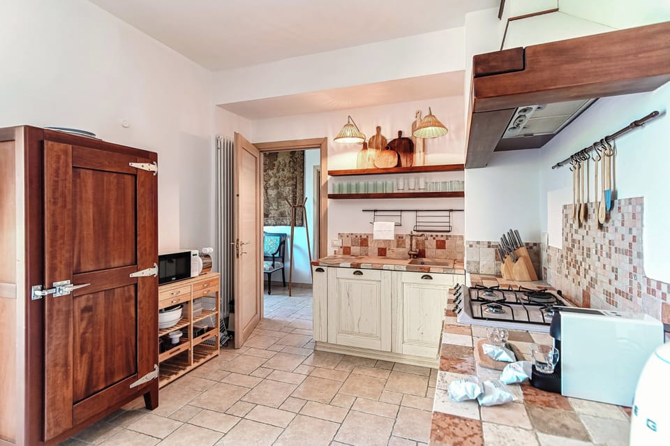Condo, Balcony, Lake View | Private kitchen | Full-size fridge, microwave, oven, stovetop