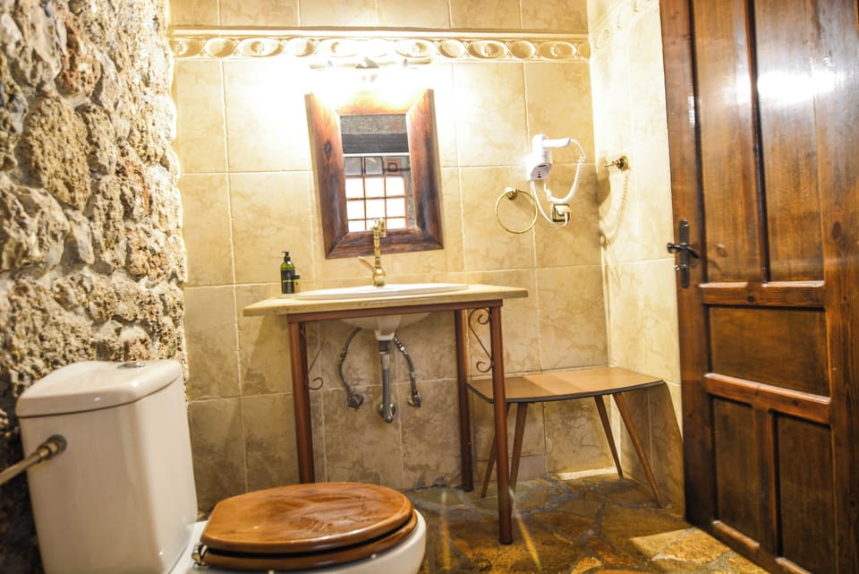 Standard Room, Balcony, Sea View | Bathroom | Shower, hair dryer, slippers, towels