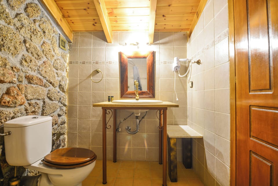Standard Quadruple Room, Balcony, Sea View | Bathroom | Shower, hair dryer, slippers, towels