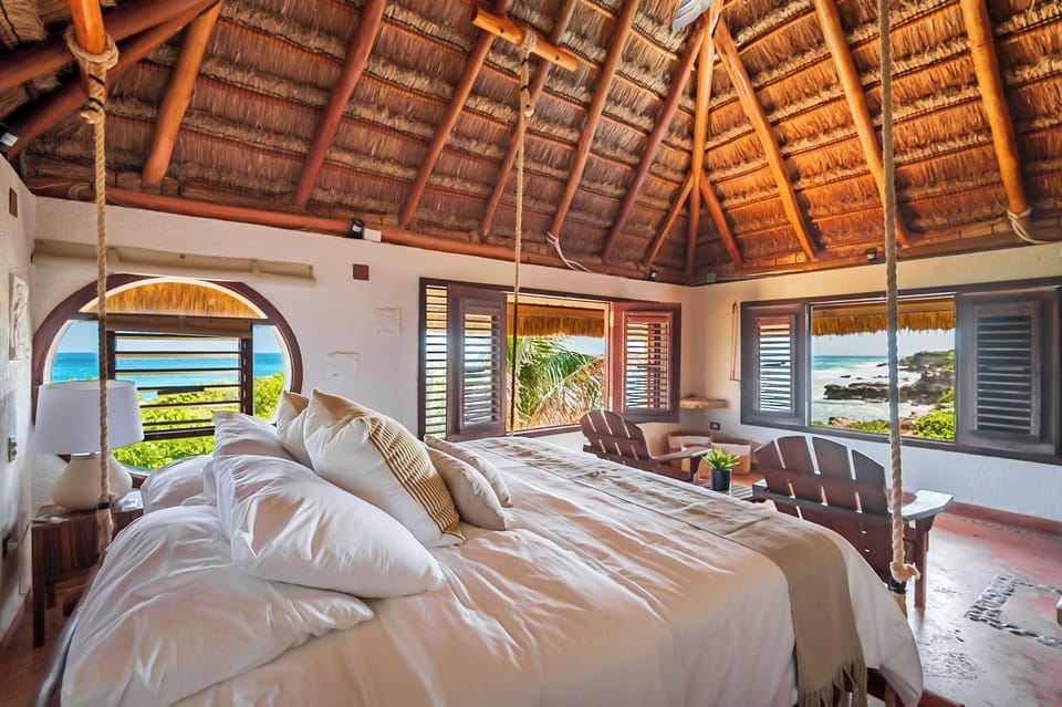 Deluxe Double Room, Partial Ocean View | In-room safe, WiFi (free), bed sheets