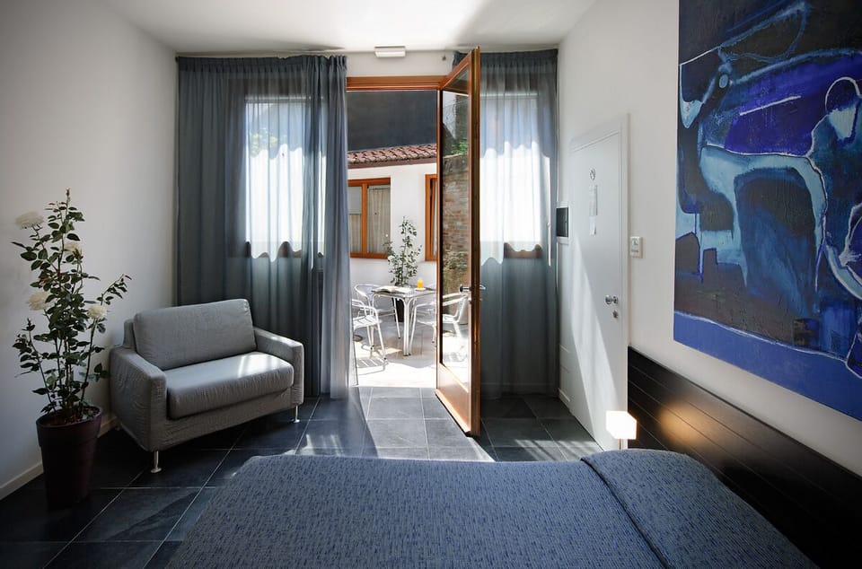 Suite, 2 Bedrooms, Kitchenette, Courtyard Area | Terrace/patio