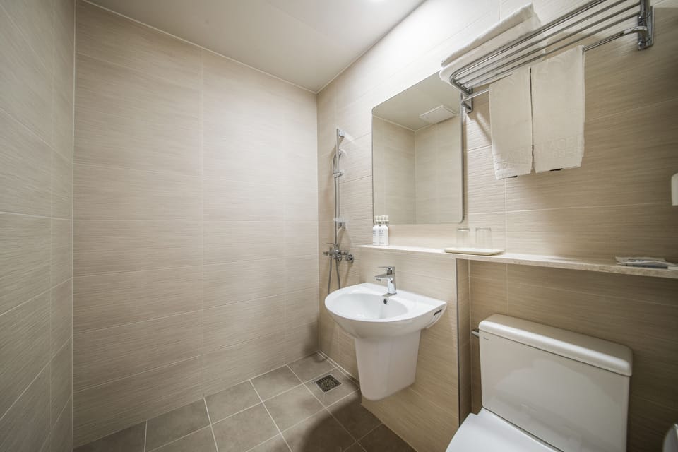 Shower, free toiletries, hair dryer, slippers