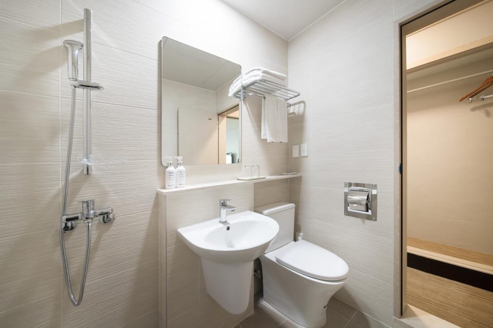 Shower, free toiletries, hair dryer, slippers