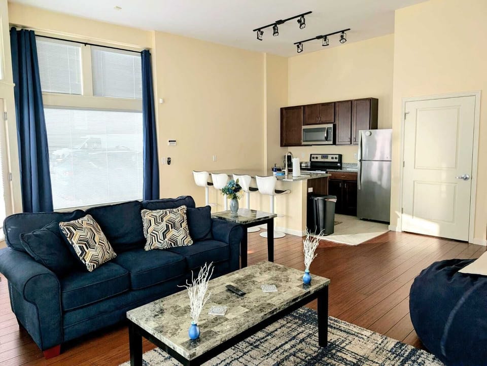 The cozy living room is designed for relaxation and entertainment.

