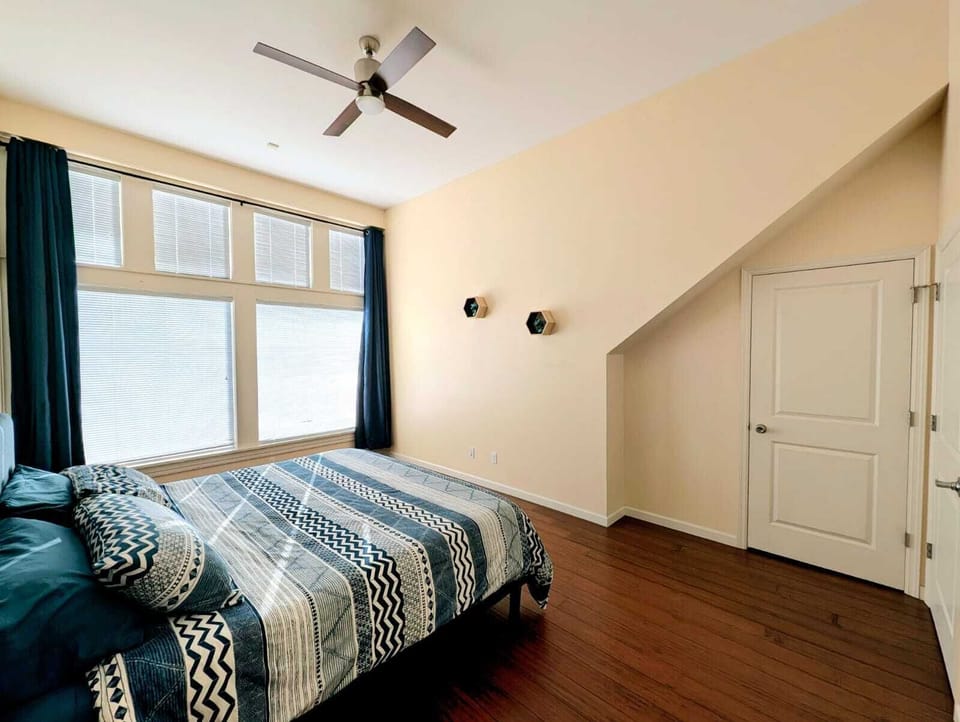 This king-sized bedroom offers the perfect retreat for relaxation and comfort.
