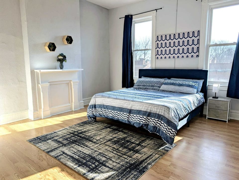 This king-sized bedroom offers the perfect retreat for relaxation and comfort.
