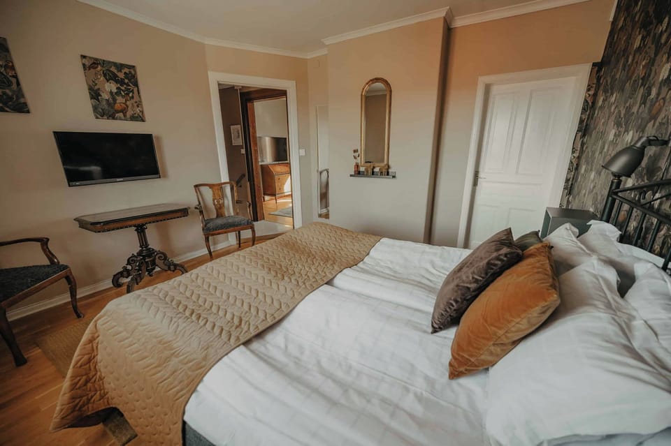 Family Room, 1 Queen Bed with Sofa bed | Iron/ironing board (on request), WiFi (free), individually decorated