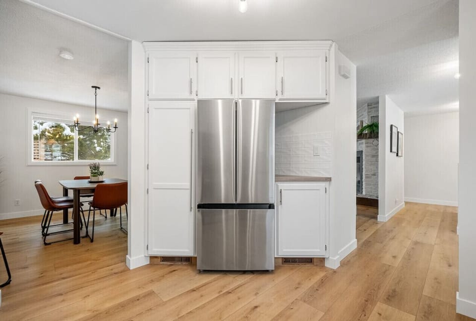 Full kitchen with a crockpot, kettle & a Keurig K-duo coffee machine.