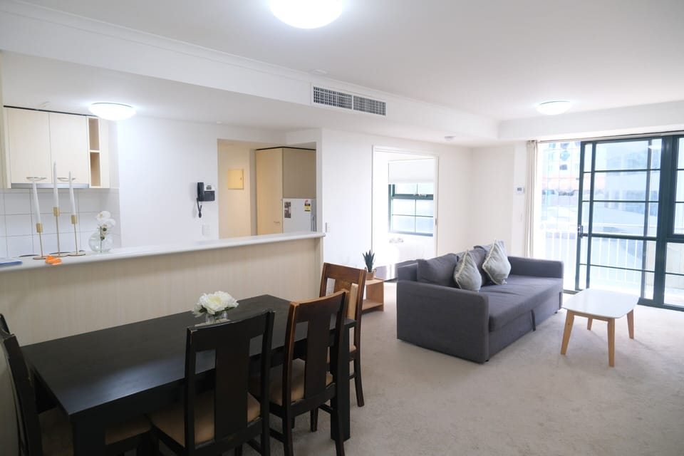 Deluxe Apartment, 3 bedrooms, 1 living room | Living area | 30-inch LED TV with digital channels
