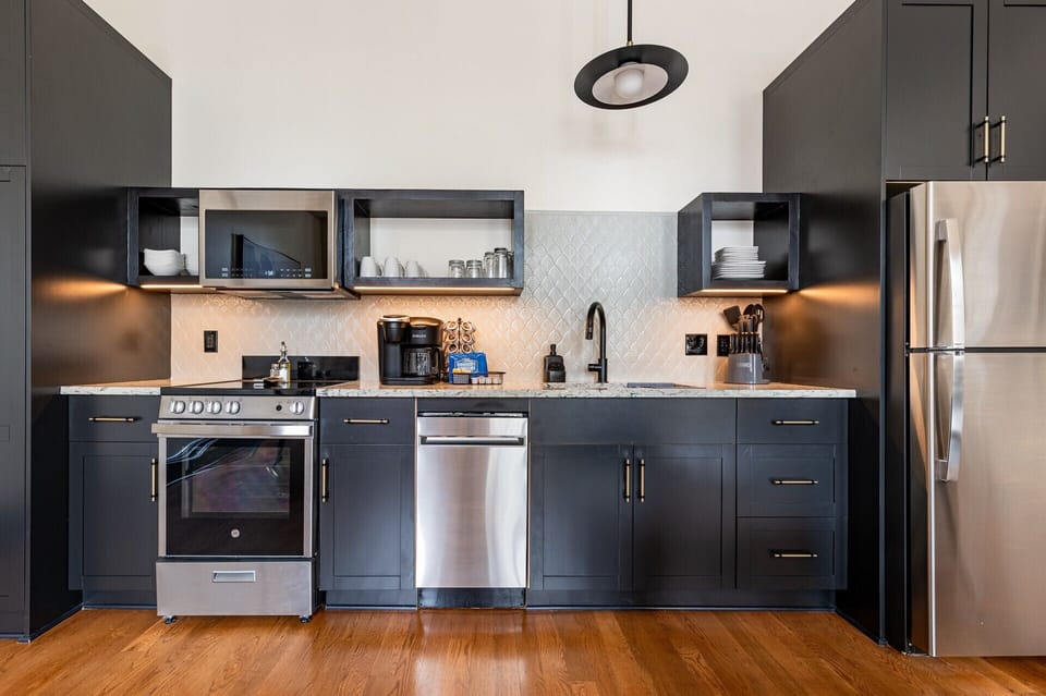 Fully equipped kitchen with modern appliances, offering everything you need for preparing meals or enjoying a morning coffee.