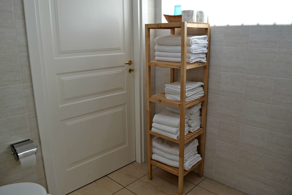 Quadruple Room | Bathroom amenities | Shower, free toiletries, hair dryer, towels