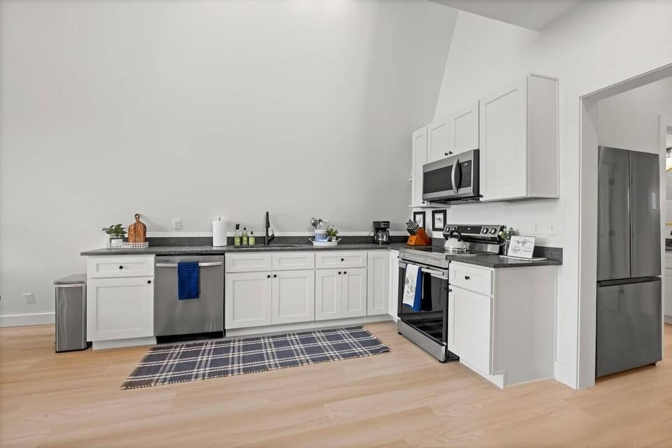 Main level - open concept living room, kitchen and dining