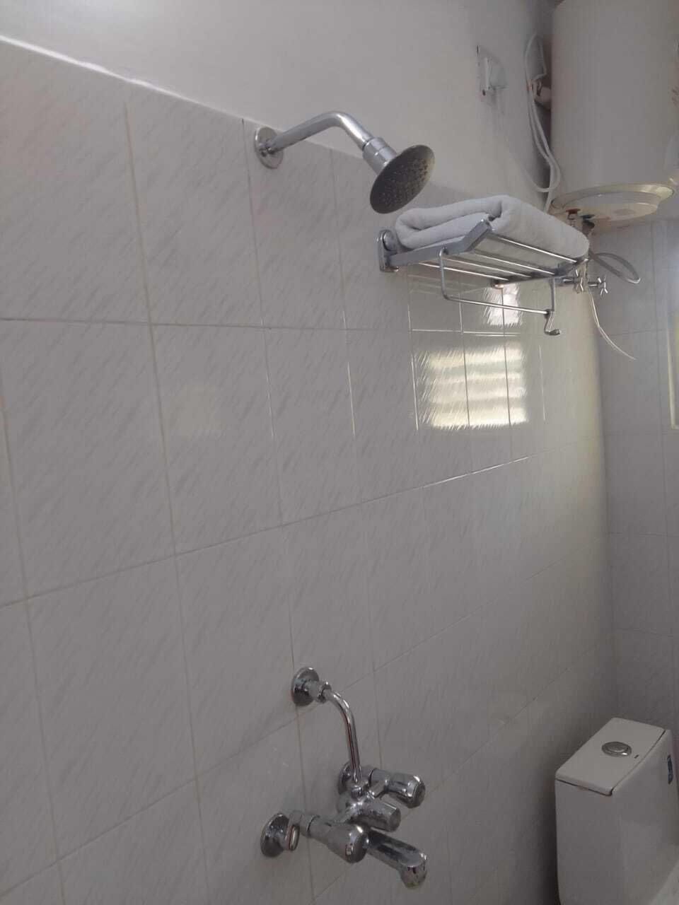 Standard Room, City View | Bathroom | Shower, towels, soap