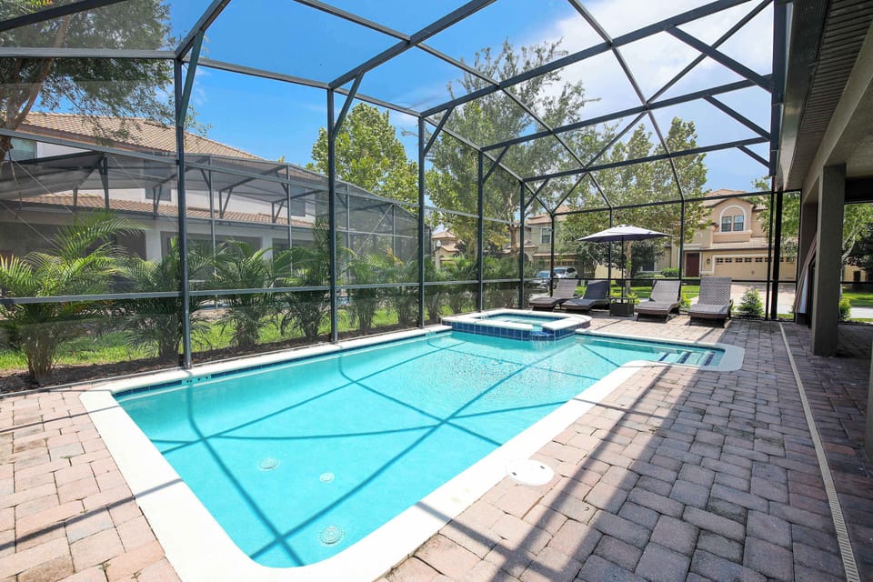 Spend quality time outdoors in your private screened pool with plenty of seating.