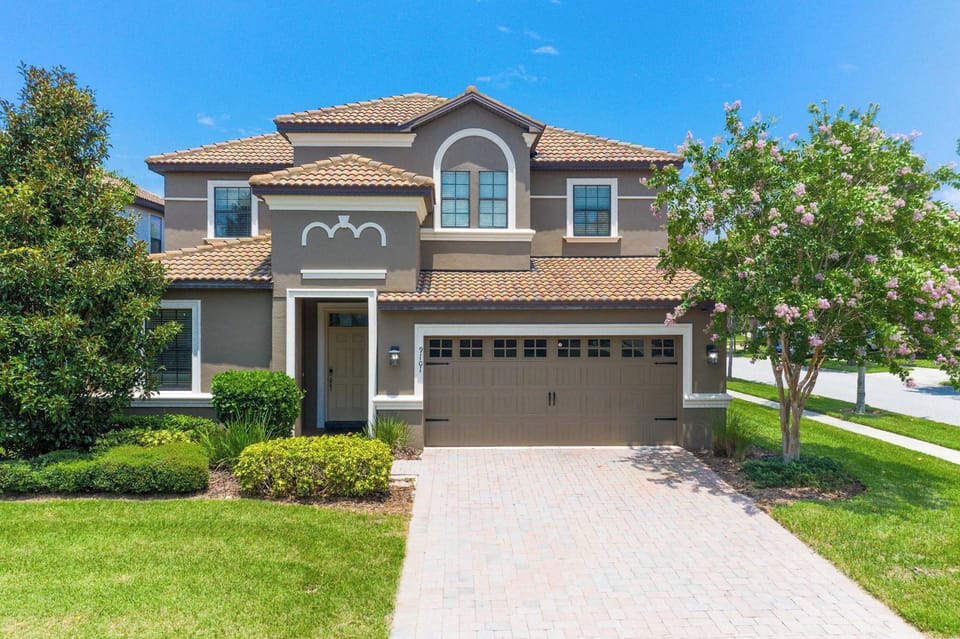 Welcome to your home away from home, a beautifully designed retreat with lush landscaping.