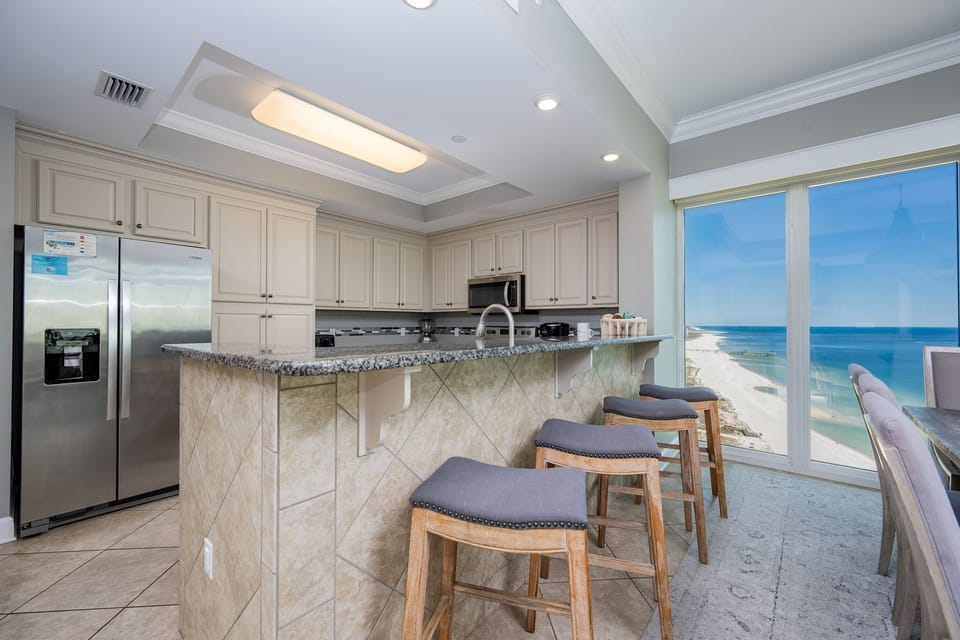 Condo, 4 Bedrooms | Private kitchen | Coffee/tea maker, fridge, oven