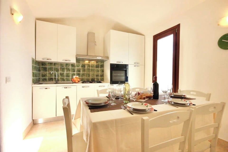 Superior Villa | Living area | 24-inch flat-screen TV with satellite channels