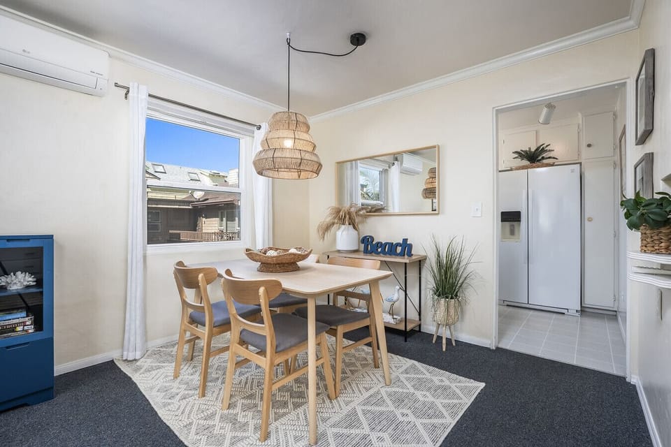 Dining area with seating for four people.