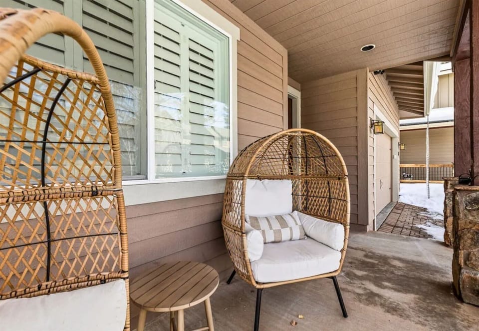 Unwind in the cozy egg chairs on the front porch, a perfect spot to relax and enjoy the fresh air.