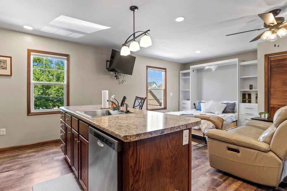 Kitchen countertop with direct access to the living area and bedroom, creating an open and convenient layout for easy living.