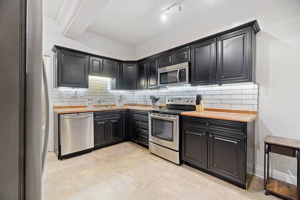 Fully equipped kitchen with modern appliances, ample counter space, and all the essentials for a convenient and enjoyable stay.