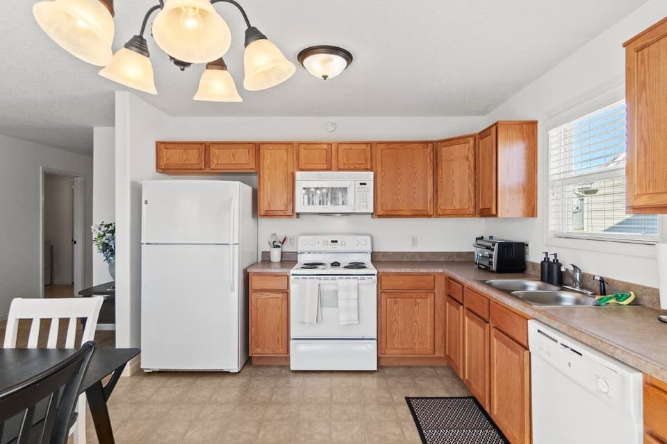 Cozy kitchen with a window, allowing natural light to brighten the space while you cook and enjoy the view.